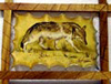 Подарок 1637 / Авторская картина выполнена на коже Волк идёт по следу. Рамка орех 38 х 29 см